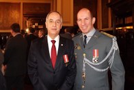 Posam para foto da esq. p/ dir.: presidente do TRE-SP, des. Mário Devienne Ferraz e coronel PM S...