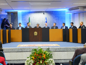 Com a palavra, ao centro da mesa principal, o novo presidente do TRE-MA, des. Raimundo Barros; ...