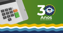 Banner com logo da série "30 anos da urna eletrônica" e imagem do teclado da urna eletrônica
